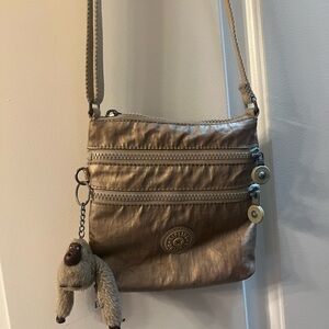 Kipling gold crossbody purse